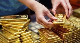 طلای جهانی از صعود بازماند